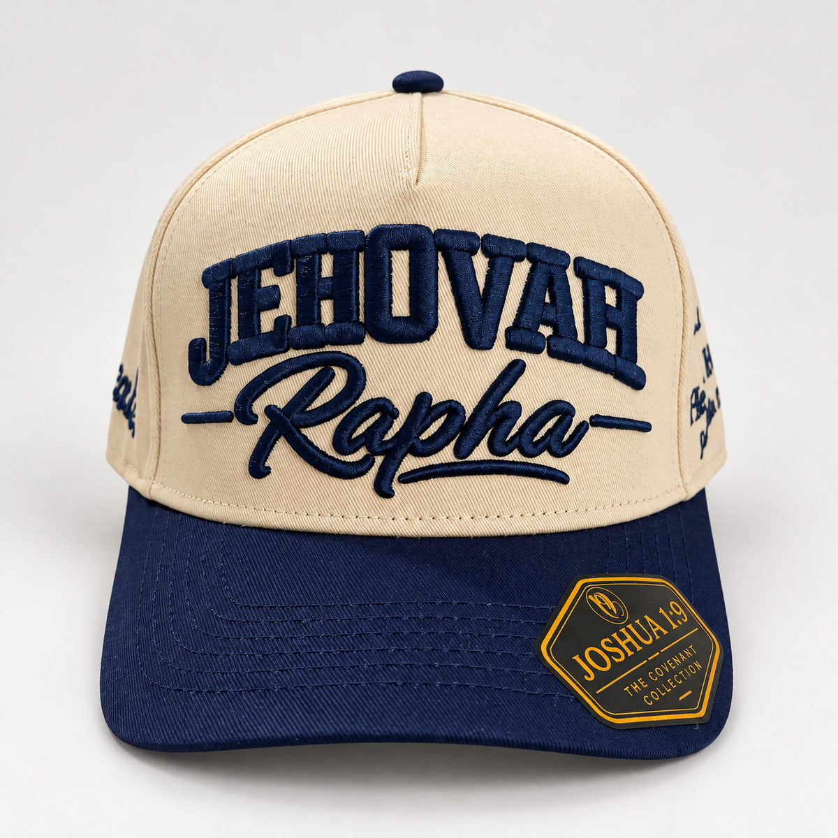 JEHOVAH RAPHA Puff Embroidered Snapback Cap | Navy Blue / Cream