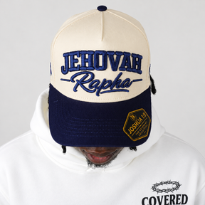 JEHOVAH RAPHA Puff Embroidered Snapback Cap | Navy Blue / Cream